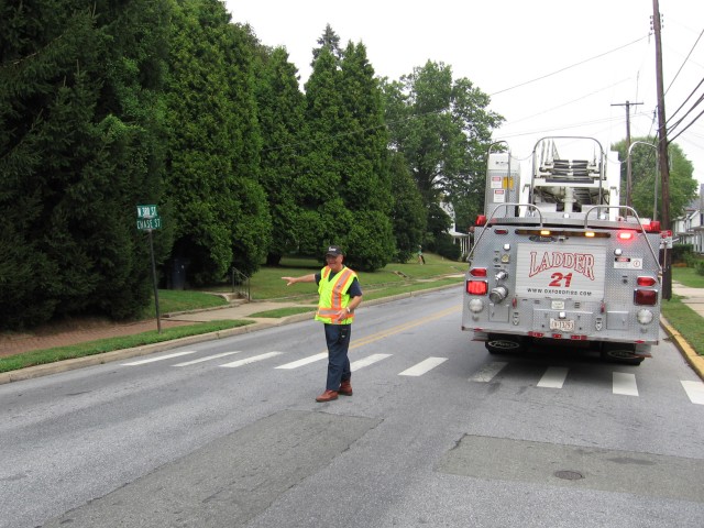 Fire Policeman Rick Weaver directing traffic on North Third Street.